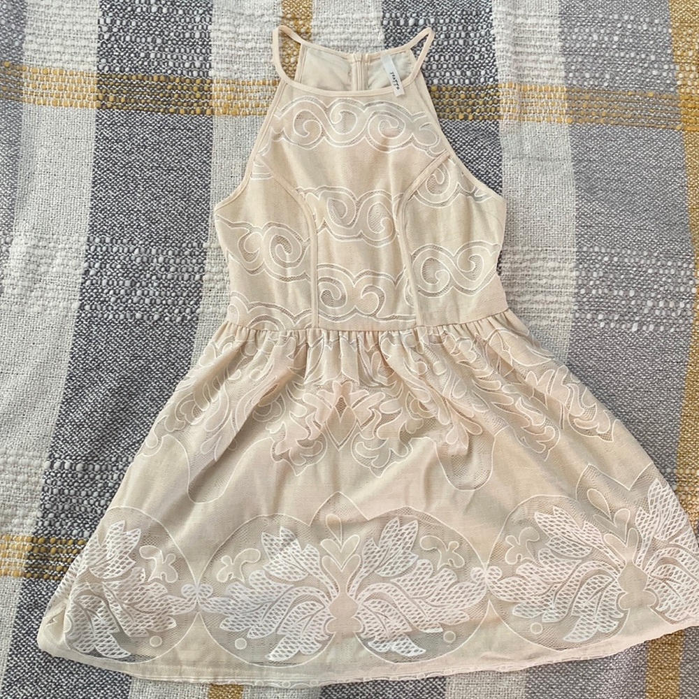Off white cream dress never worn. Unsure of size xs/s